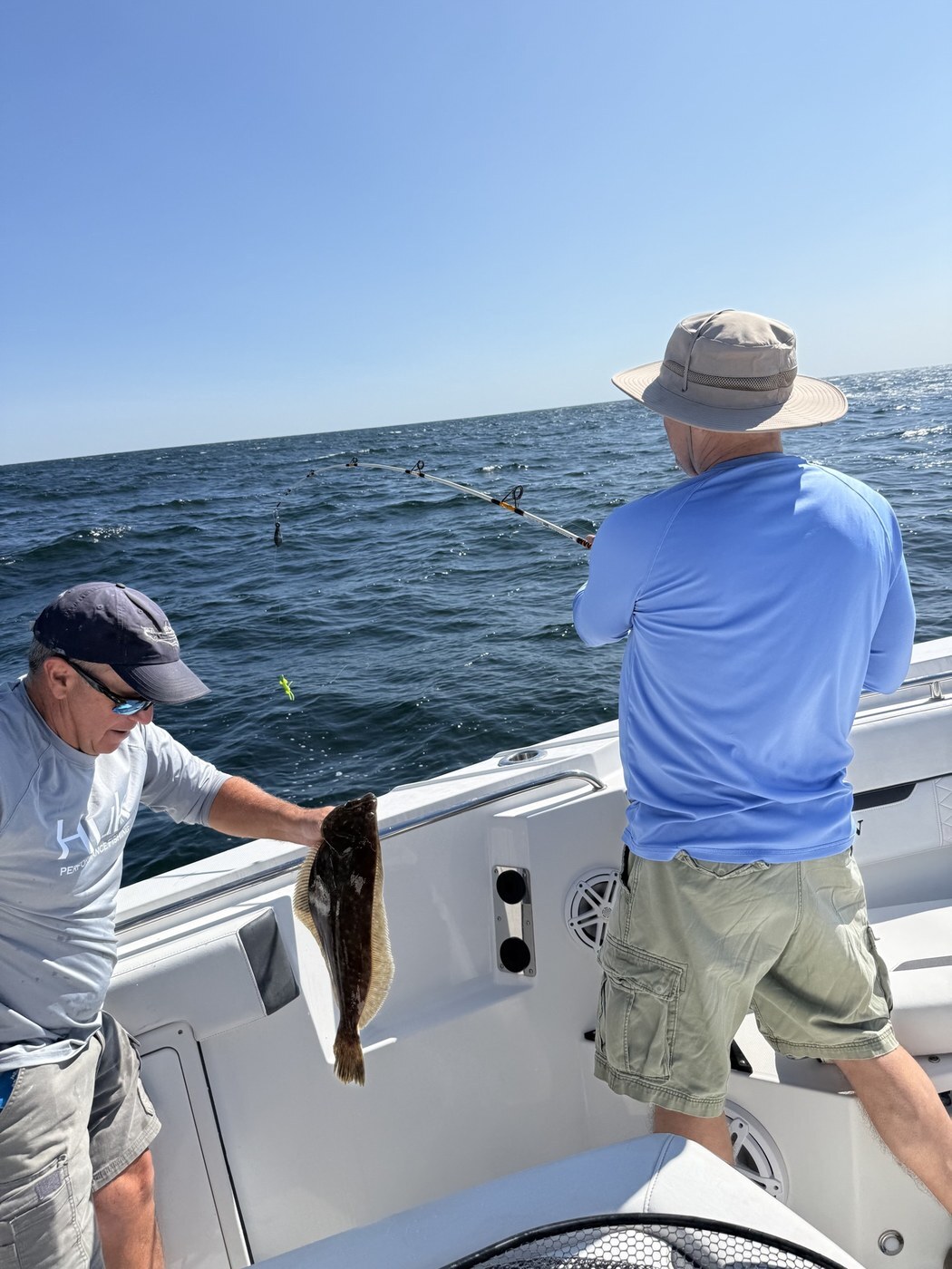 Hooked up, fluke coming aboard
